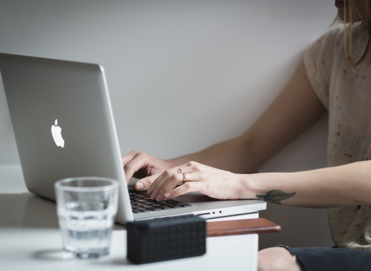 Close Up of Someone Typing on a Computer